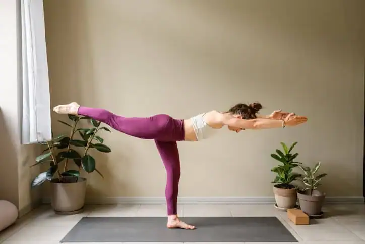 Woman doing Yoga exercise Horsham to help with toning the body. 