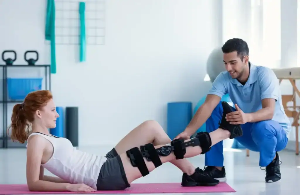 Woman having treatment to help muscle recovery Horsham after an injury